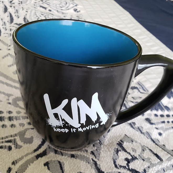KIM keep it moving coffee mug, blue inside